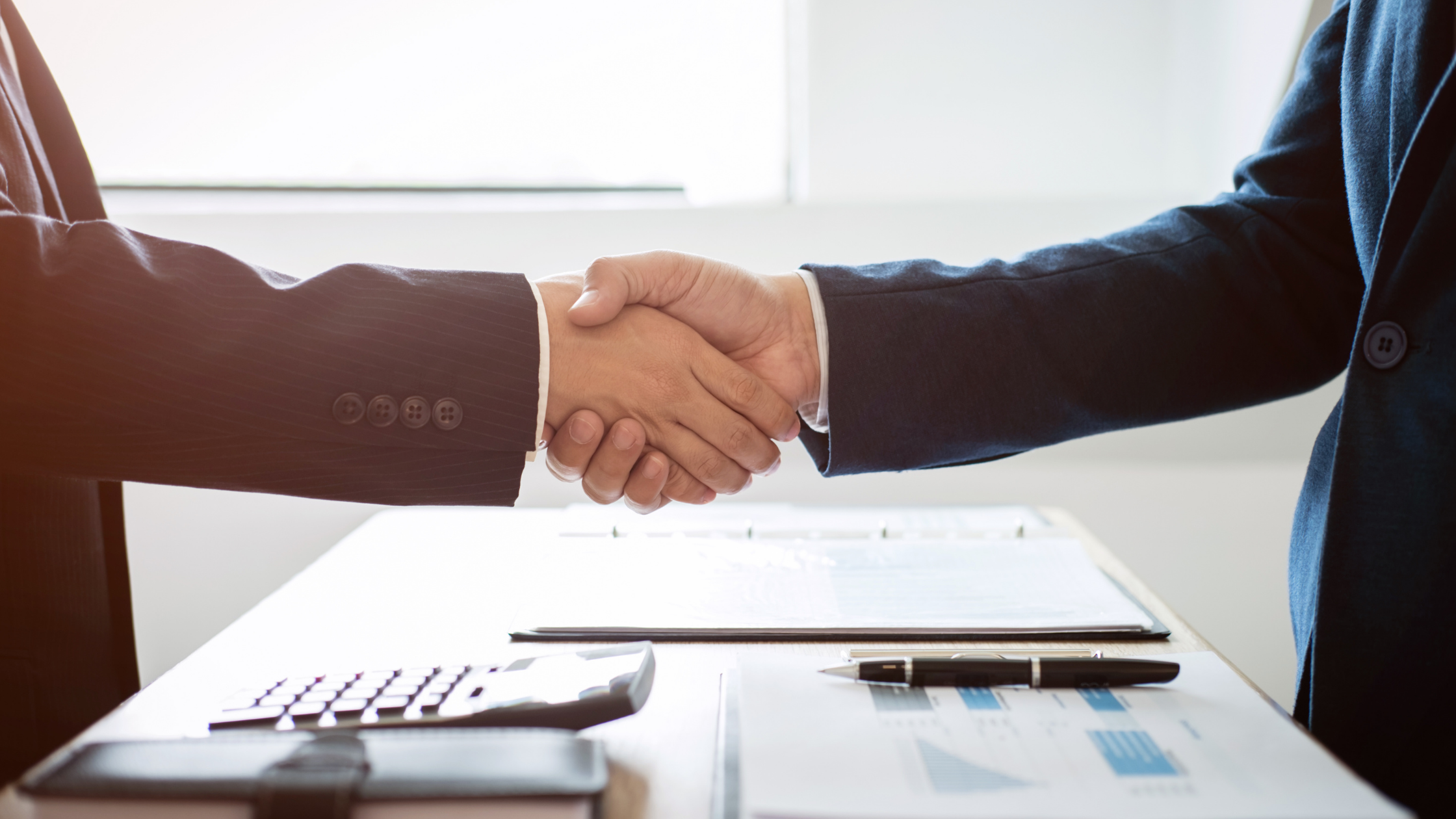 Mergers and acquisitions for business deal handshake professionals